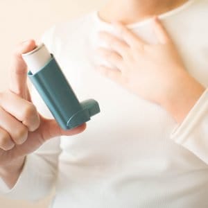 Person With Inhaler