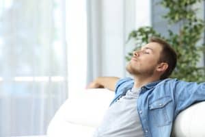 Man At Home Breathing Comfortably